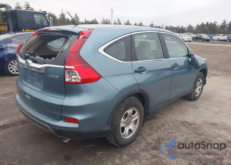 2015 Honda Cr-V Lx z USA, uszkodzony, nr VIN 2HKRM4H35FH690874